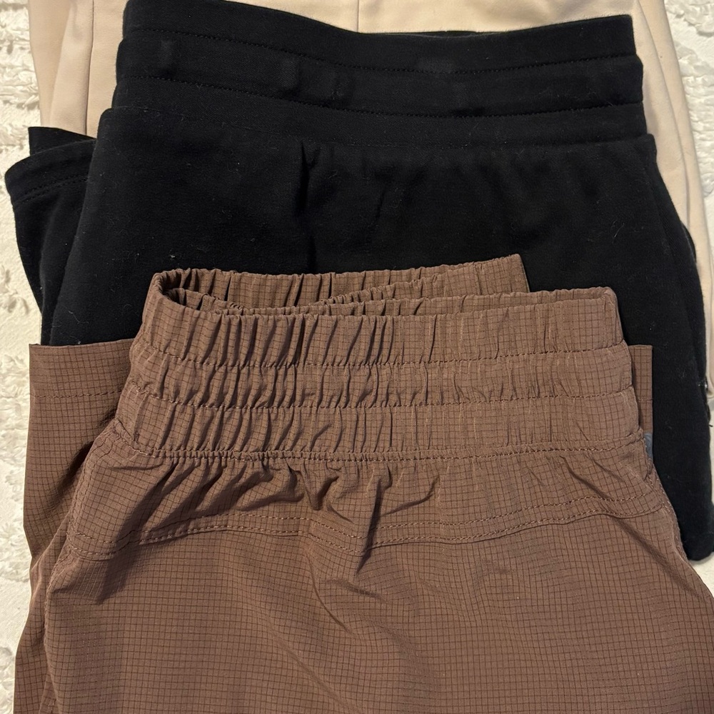Three women’s skorts - Black, Brown, and Beige - size L